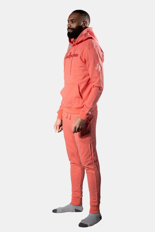 Woodpecker Unisex Cotton Sweatsuit In Orange