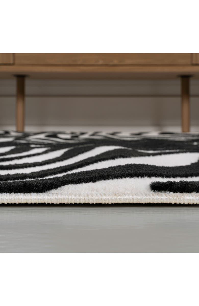 JONATHAN Y Maribo High-Low Abstract Groovy Striped Indoor/Outdoor Area Rug, Alternate, color, Black/White