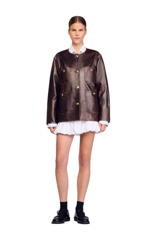 Sandro Long Distressed Leather Jacket In Brown
