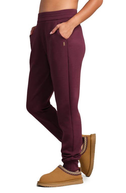 Rhone Dreamglow Tapered Pants In Burgundy