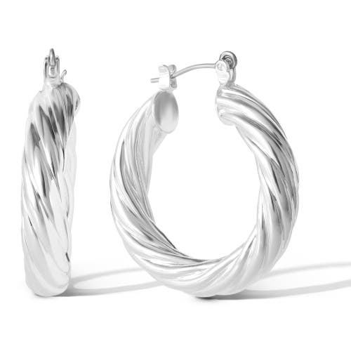 Jessica Simpson Thick Twisted Hoop Earrings In Metallic