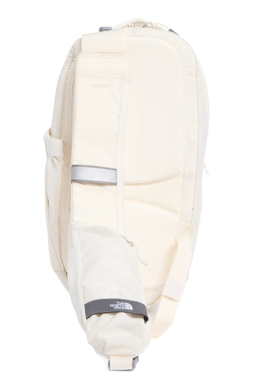 Shop The North Face Borealis Water Repellent Sling Backpack In White Dune/gravel