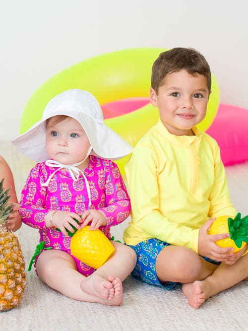 Rufflebutts Baby Girls Long Sleeve Upf50+ One Piece Rash Guard In Neon Violet Pineapples