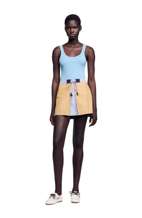 Short dual-material skirt