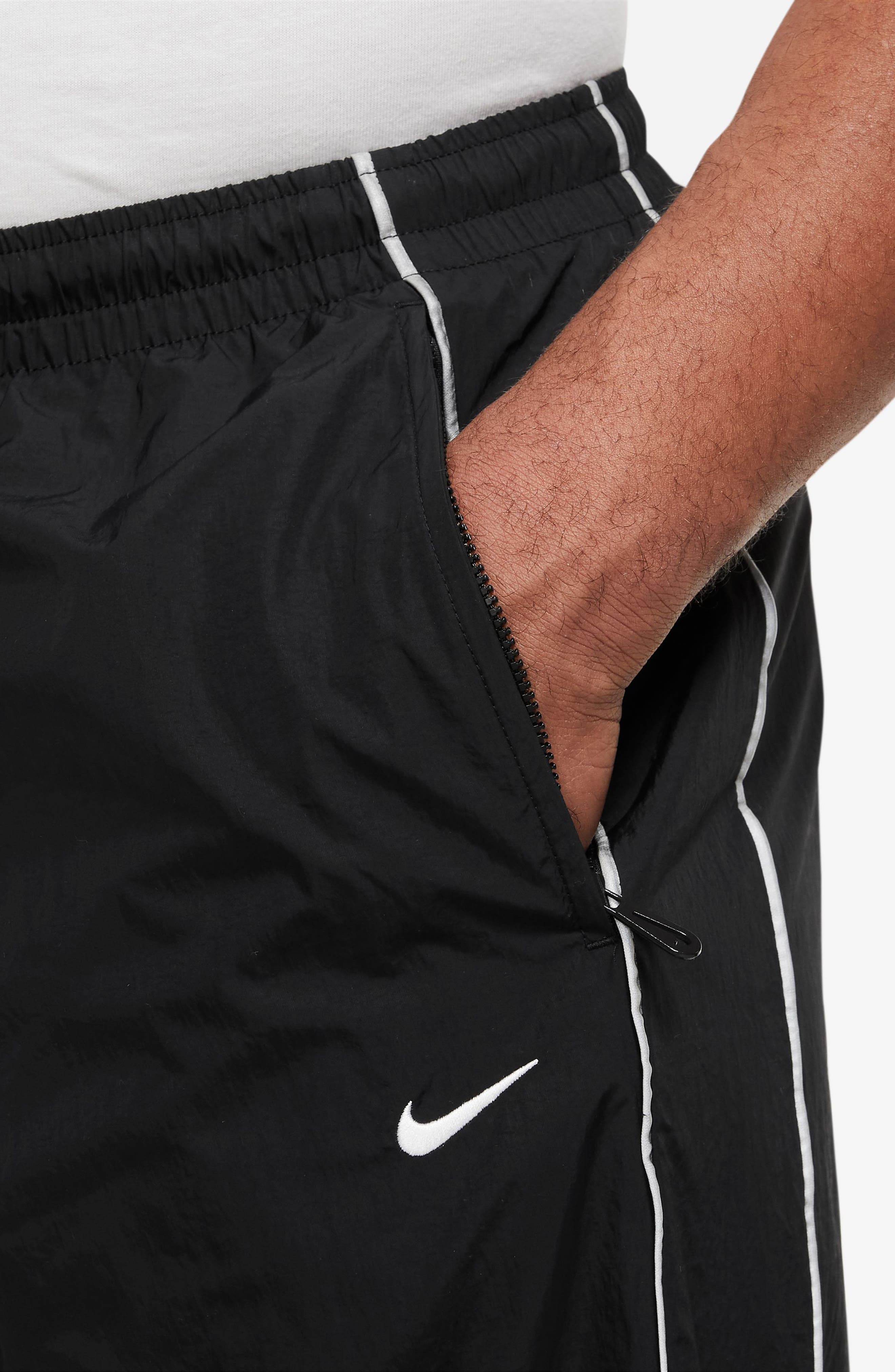 Solo Swoosh Water Repellent Track Pants (Men) | Nordstrom