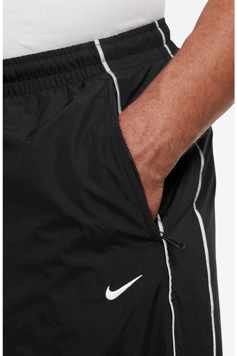 Nike Solo Swoosh Water Repellent Track Pants (Men) | Nordstrom