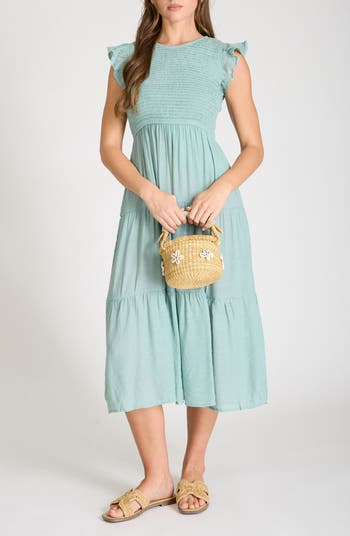 sachin and babi light blue dress 50+ Engagement Looks For Brides-To-Be main image 1