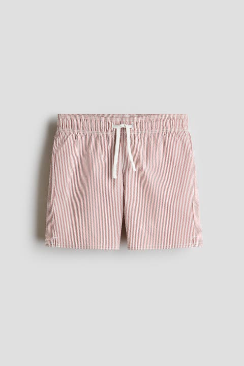 Patterned swim shorts