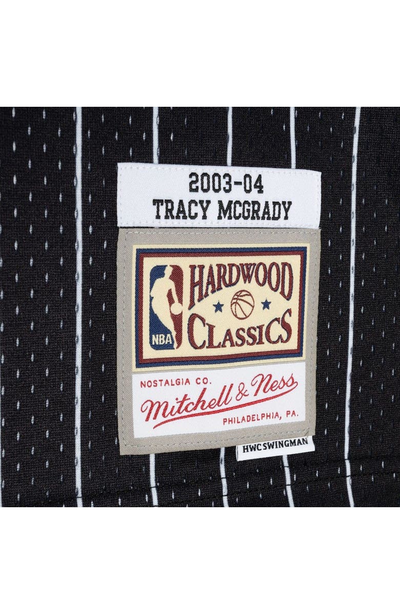 Mitchell & Ness Men's Mitchell & Ness Tracy McGrady Blue/Black Orlando Magic Hardwood Classics 2003-04 Split Swingman Jersey, Alternate, color, 