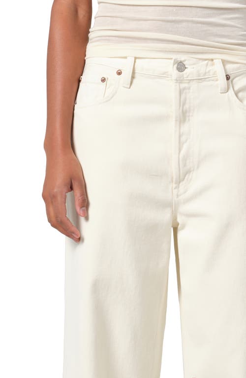 Shop Agolde Low Slung Baggy Jeans In Solar