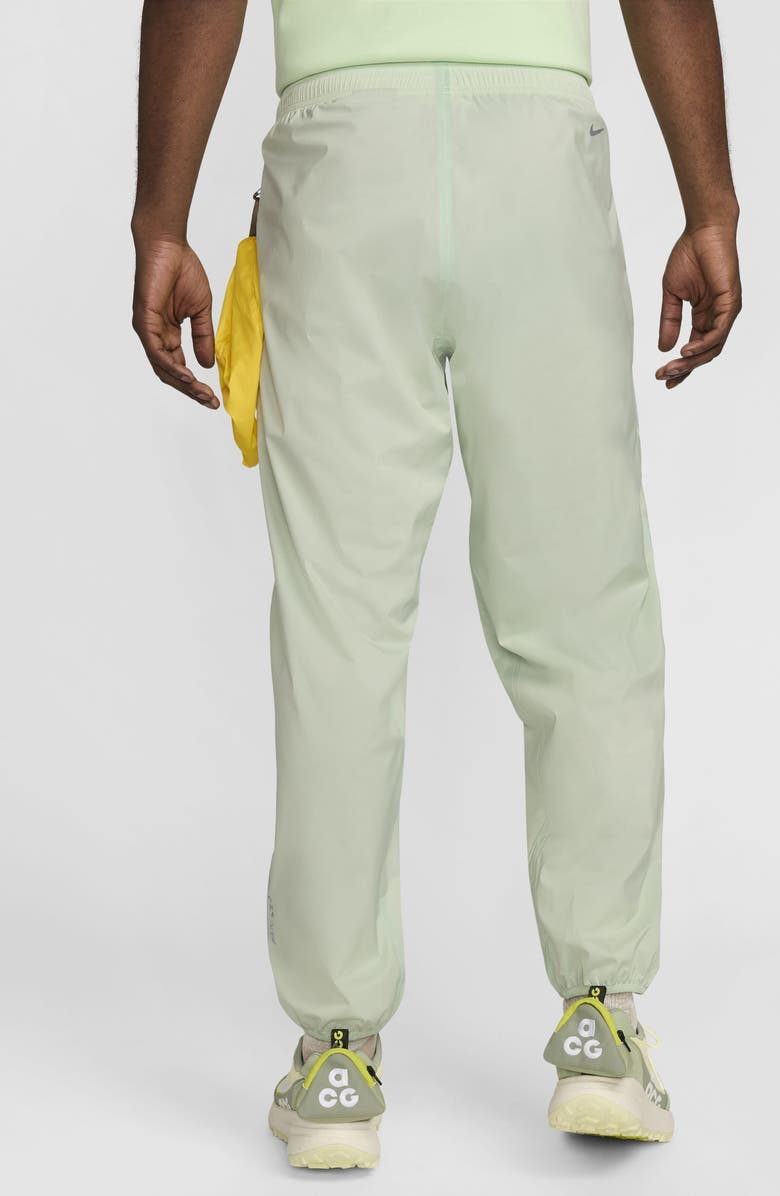 Nike ACG Trail Snacks Storm-FIT ADV Pants, Alternate, color, Vapor Green/ Reflective Silver