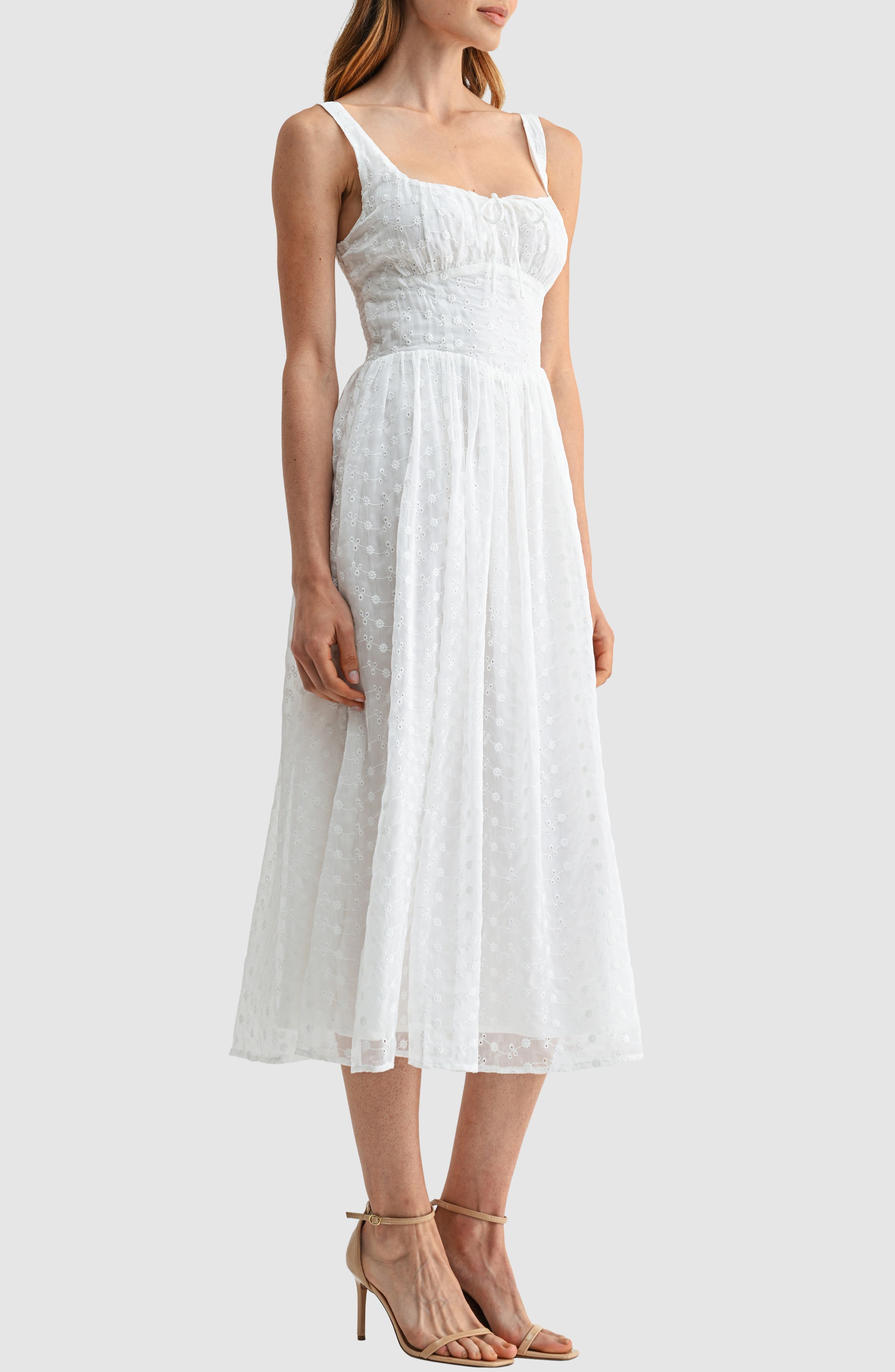 white eyelet midi dress – Amour Boutique Our Lucia Eyelet Strapless Midi Dress in White features intricate eyelet detailing and a chic strapless design Pixie Market Cotton Eyelet Midi