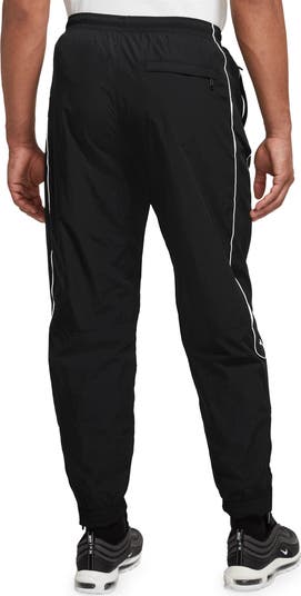 Solo Swoosh Water Repellent Track Pants