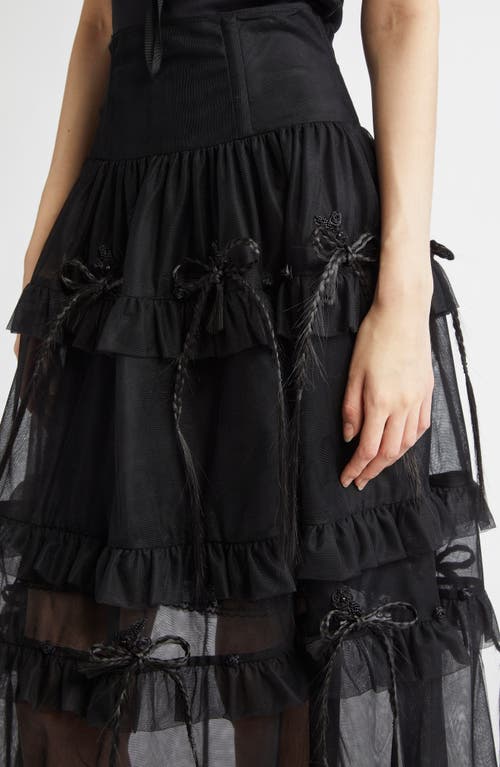 MERUERT TOLEGEN MERUERT TOLEGEN CORSET WAIST TIERED MAXI SKIRT WITH FAUX HAIR BOWS