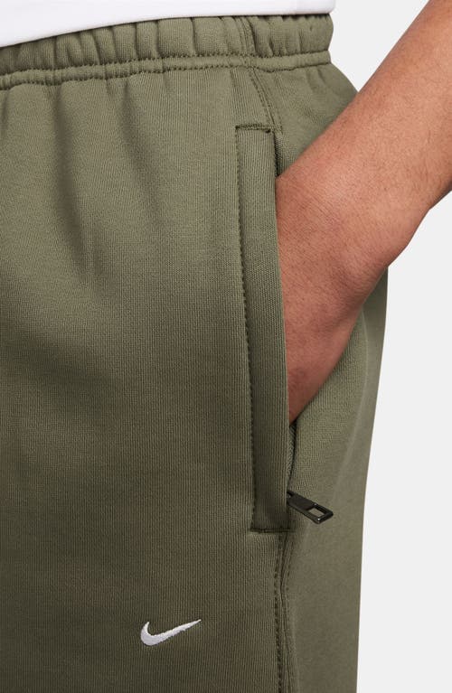 Nike Solo Swoosh Open Hem Fleece Sweatpants In Green