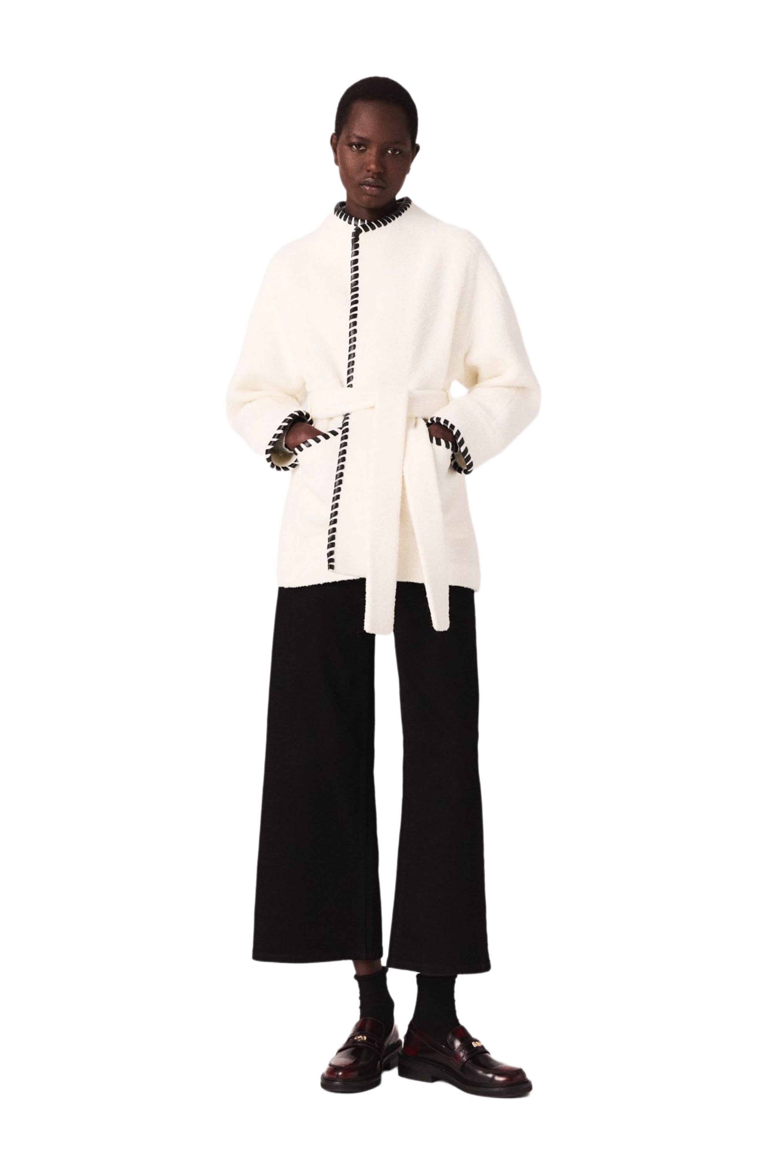 Lined coat with contrasting ribbon