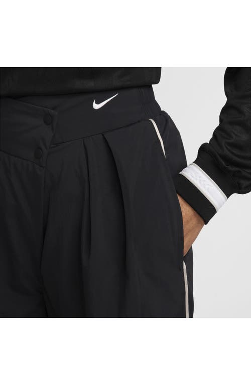 Nike Asymmetric Waist Water Repellent Pants In Animal Print