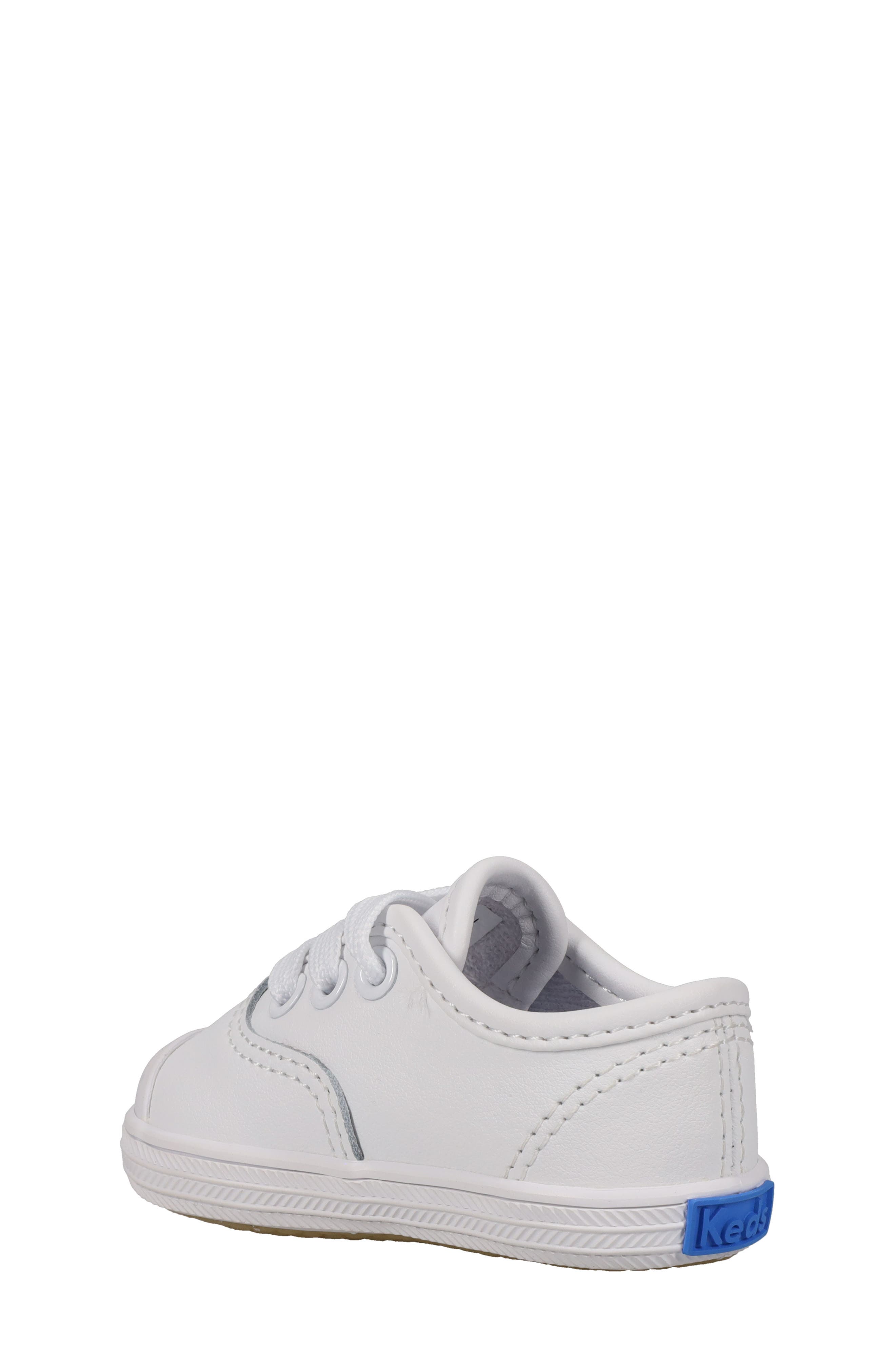 Keds<sup>®</sup> Kids' Champion Cap Toe Crib Shoe, Alternate, color, 