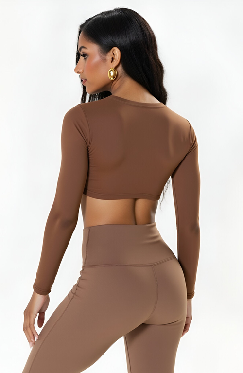 Modenaire Active Long Sleeve Twist Front Crop Top In Brown