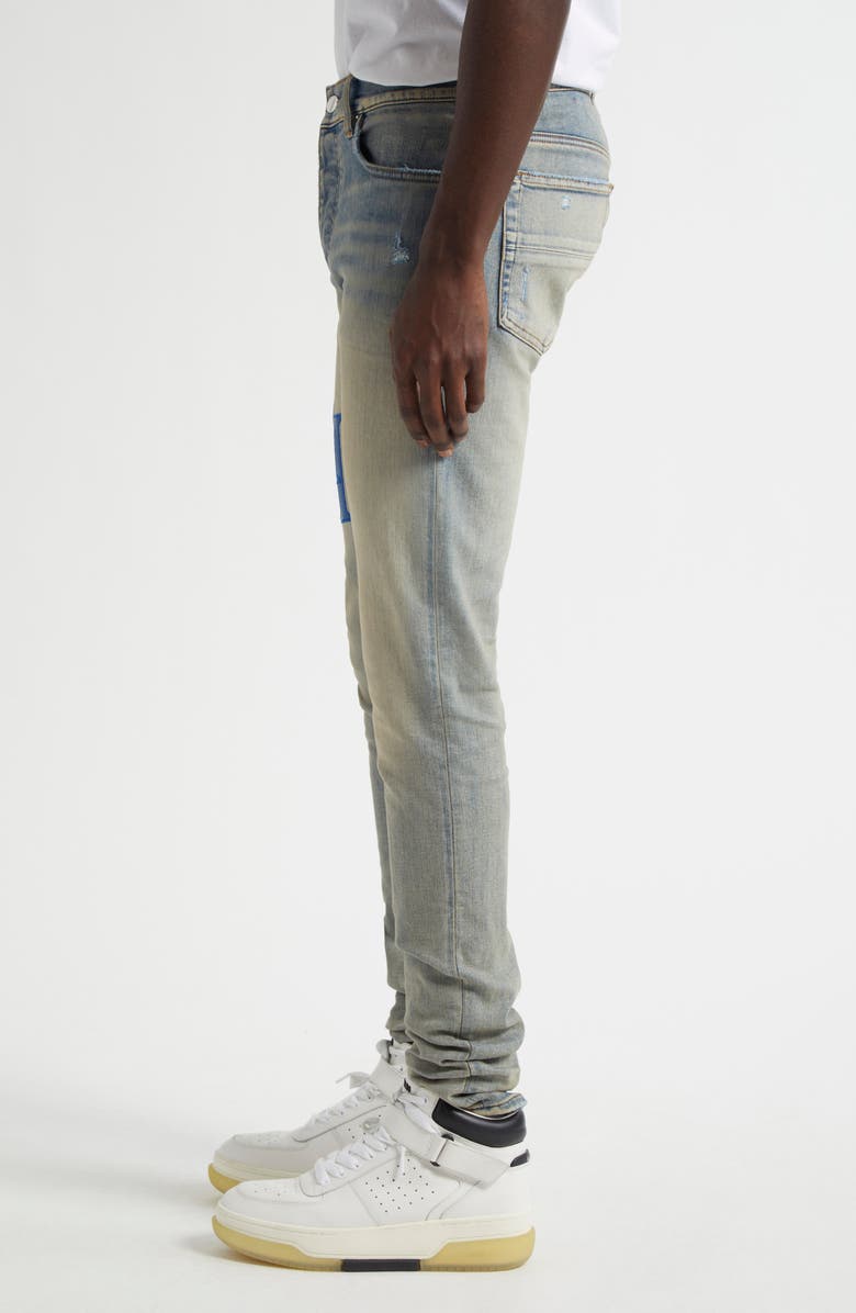 AMIRI Staggered Logo Skinny Jeans, Alternate, color, 