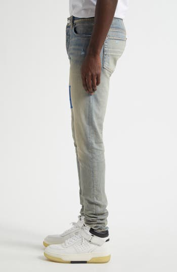 Staggered Logo Skinny Jeans