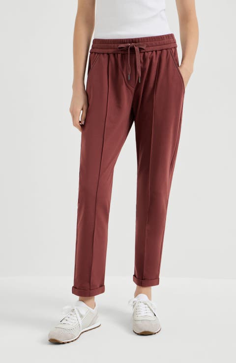 Track trousers with monili