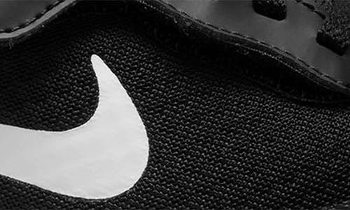 Nike Kids' Tanjun Ez Sneaker In Black/white/white