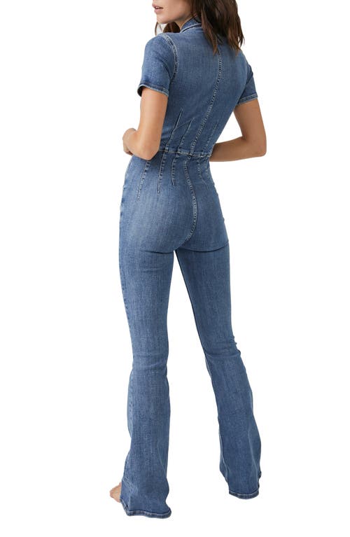 Free People Jayde Denim Flared Jumpsuit In Sunburst Blue