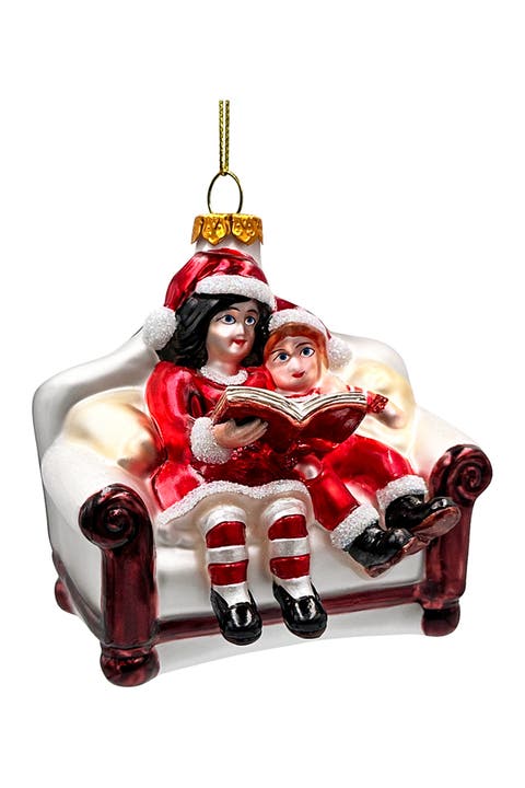 Kids Reading On Couch Glass Christmas Ornament
