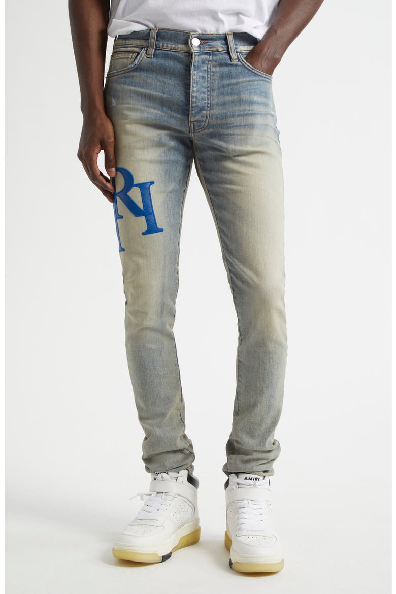 AMIRI Staggered Logo Skinny Jeans (Men) | Nordstrom