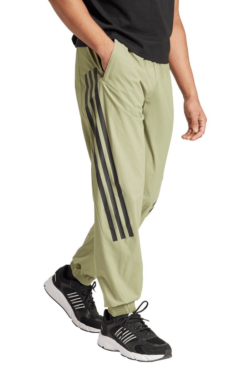 ADIDAS SPORTSWEAR Future Icons 3-Stripes Woven Pants, Alternate, color, Tent Green