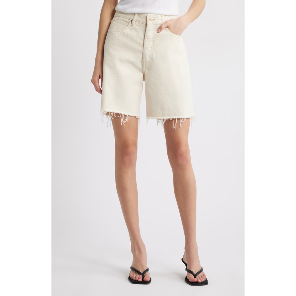 Shop Frame The Timeless Cutoff Denim Shorts In Milkshake