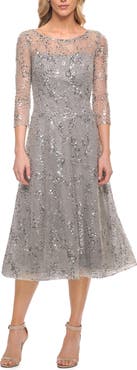 La Femme Lace Tea Length Dress with Flare Skirt and High Neckline