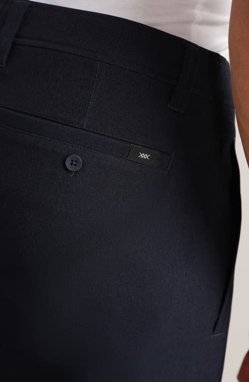 Rhone Nomad Slim Fit Tech Water Repellent Chinos In Blue