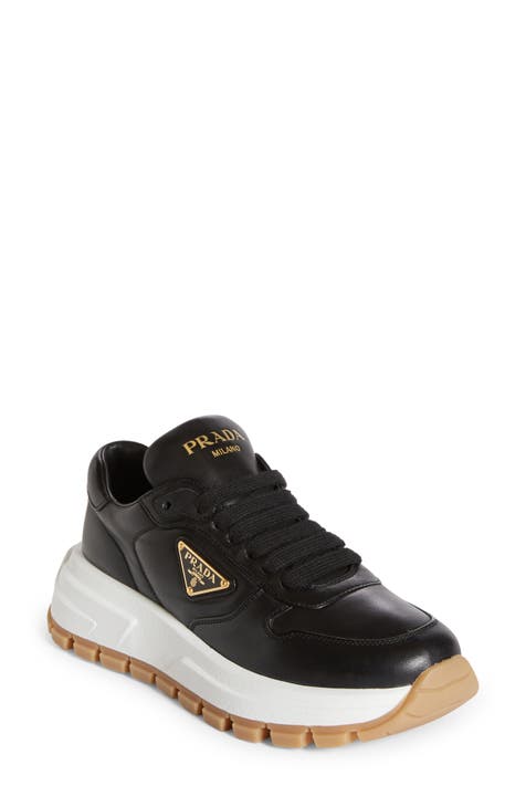 Black designer sneakers on sale