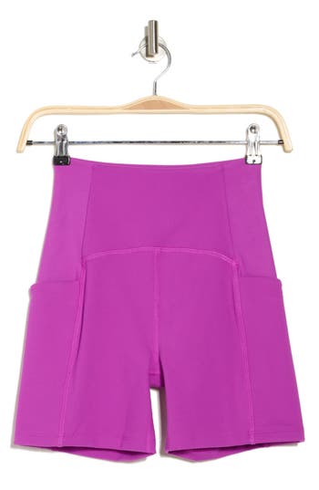 Shop Beyond Yoga Powerbeyond™ Strive Pocket Bike Shorts In Violet Berry