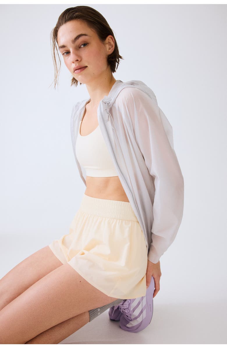 H&M Double-layered sports shorts, Alternate, color, Butter Yellow