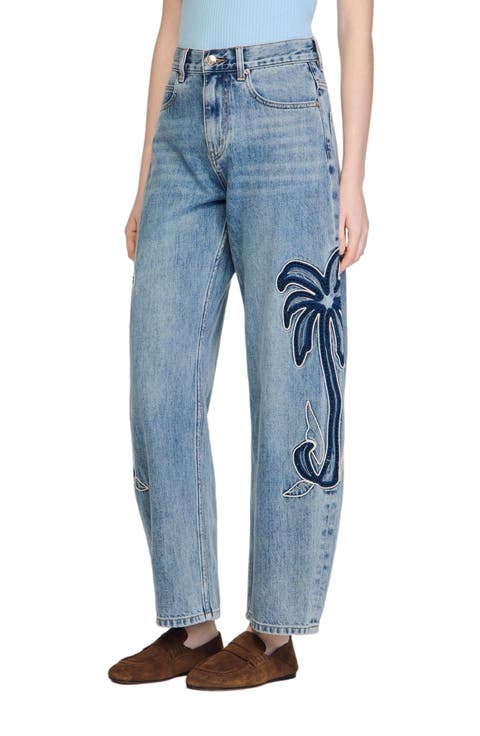 Palm-embroidered wide barrel jeans