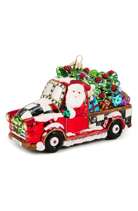 Santa Hitting the Road Glass Ornament