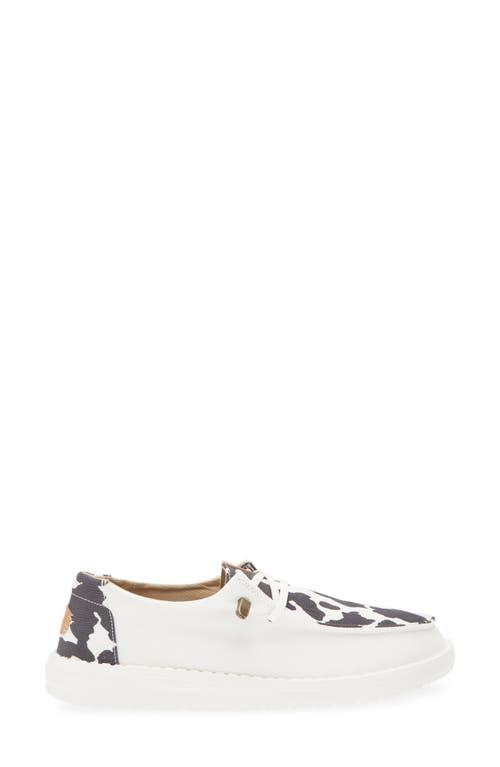 Hey Dude Wendy Animal Print Slip-on Moc Toe Shoe In White/black Cow Print