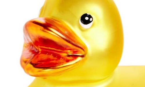 Old World Christmas Rubber Ducky Glass Ornament In Yellow/orange