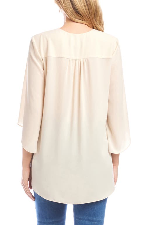 Karen Kane Crossover Hem Asymmetric Top In White