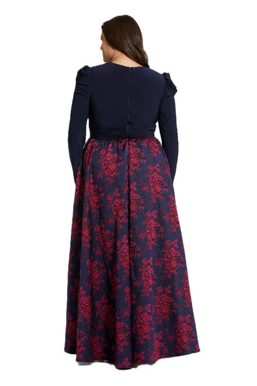 Mac Duggal Long Sleeve Keyhole Knot Neck Brocade Floral Detail Bottom Plus Size Gown In Midnight