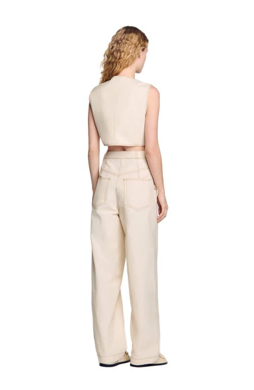 Sandro Denim Cropped Jacket In Sand