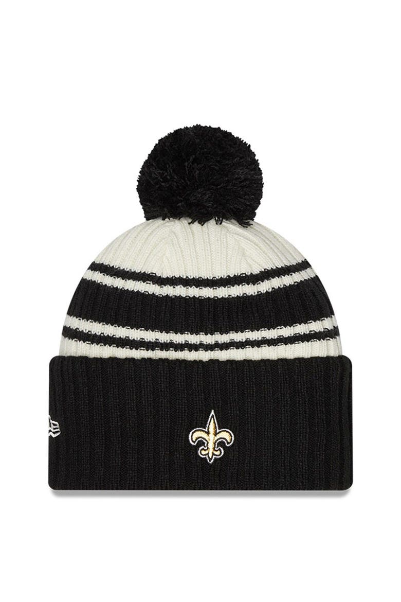 Men's New Era Cream/Black New Orleans Saints 2022 Sideline Sport Cuffed Pom Knit Hat, Alternate, color, Cream
