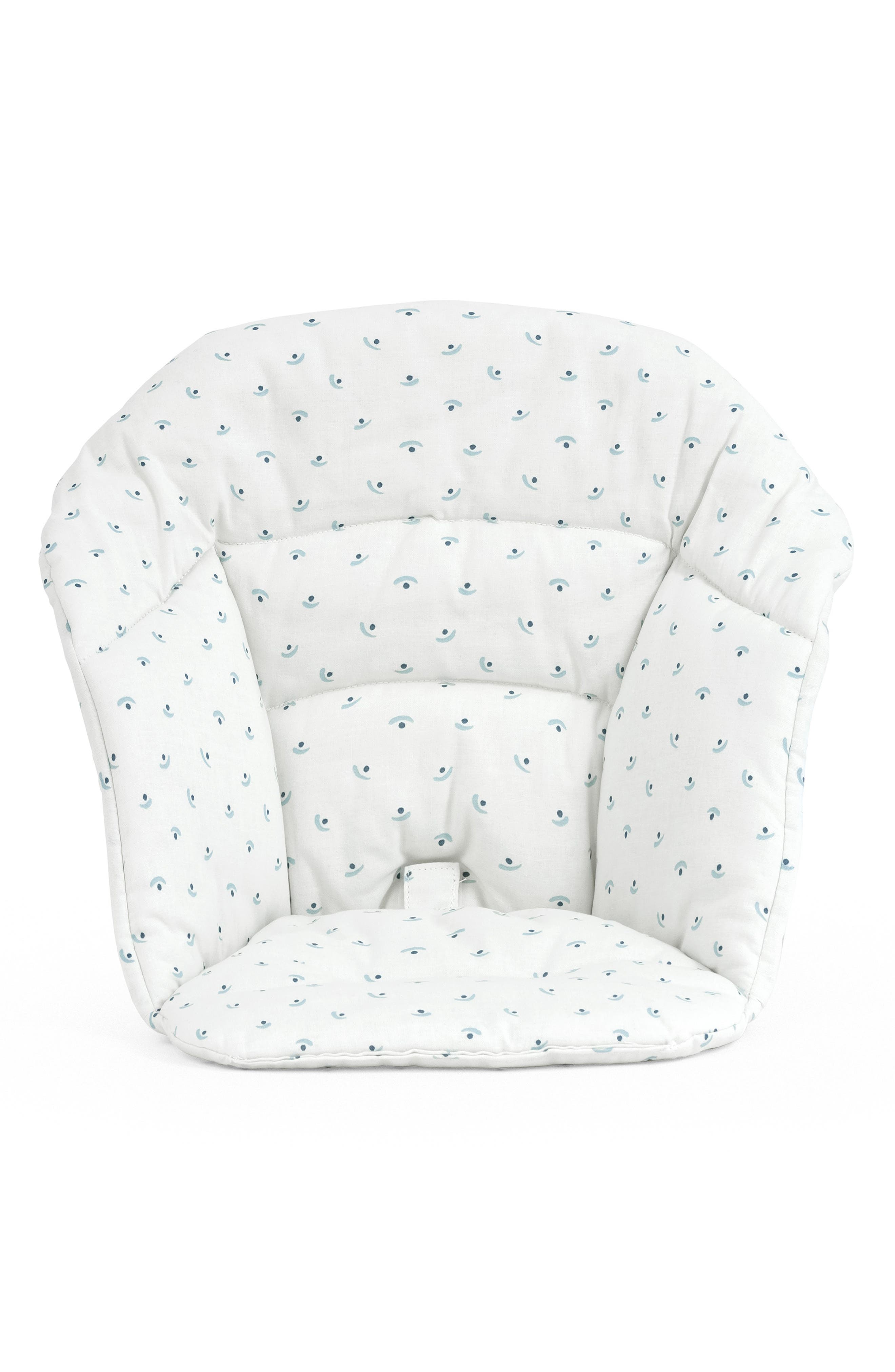 A white bean bag chair with small blue dots